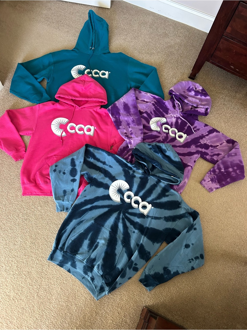 4 CCA solid and tie-dye hoodies